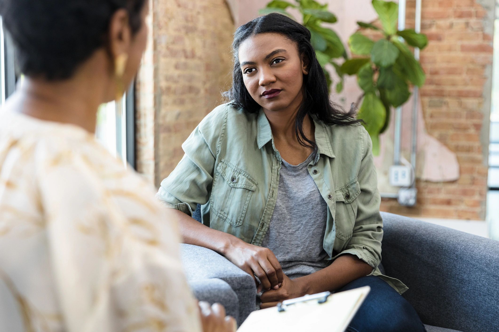Counselor listening attentively during a supportive conversation