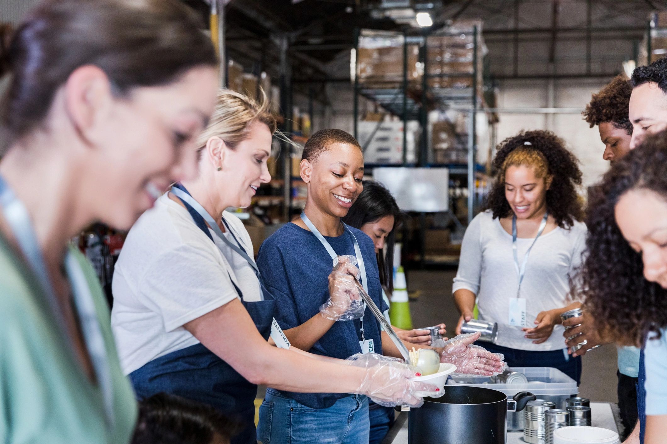 Volunteers working together in a warehouse